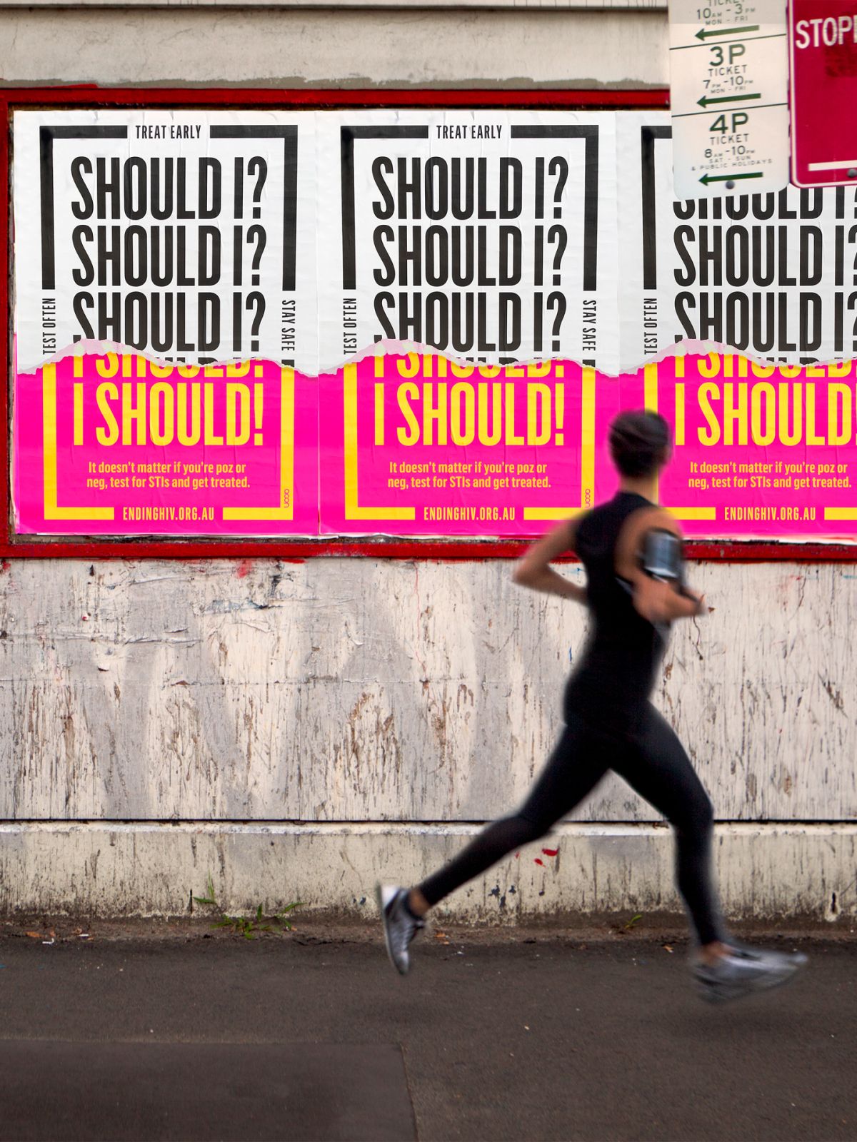 Person running past ACON STI Testing and Treatment posters
