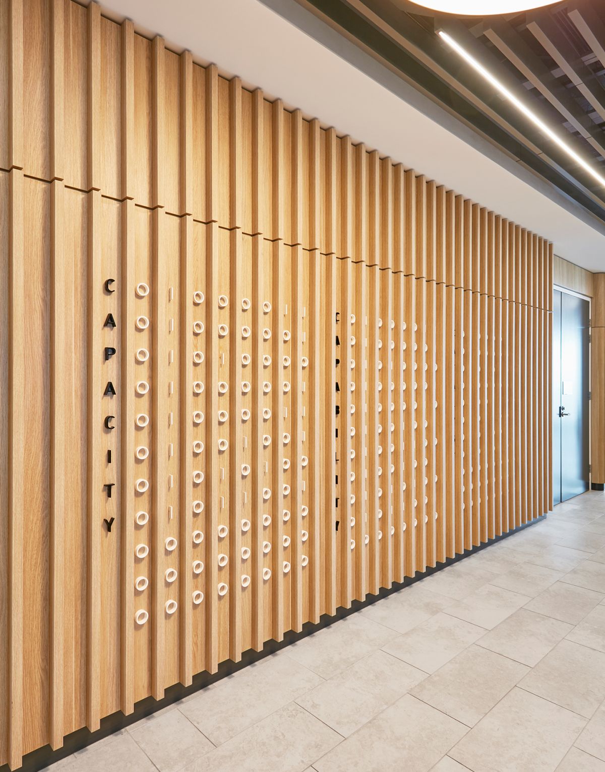 Australian Computer Society graphics reflecting use of binary code on wall