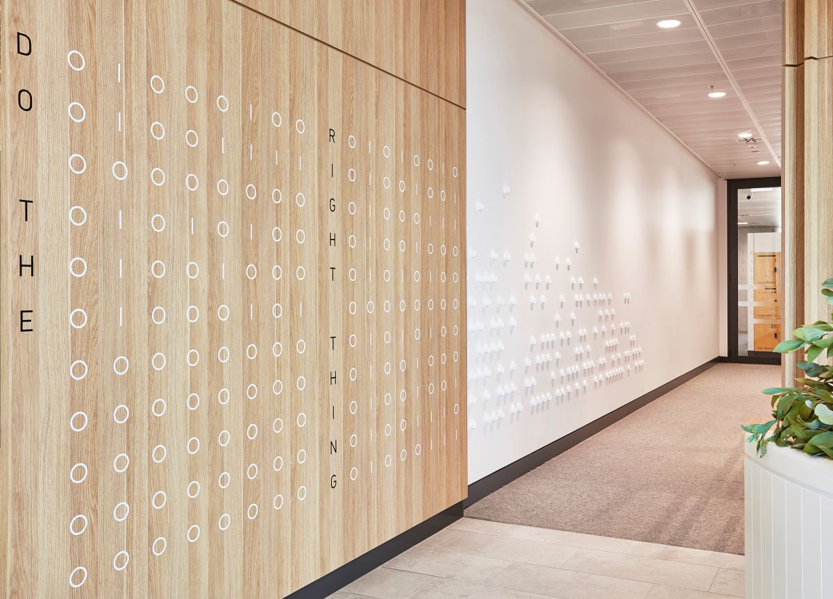 Australian Computer Society graphics reflecting use of binary code on wall