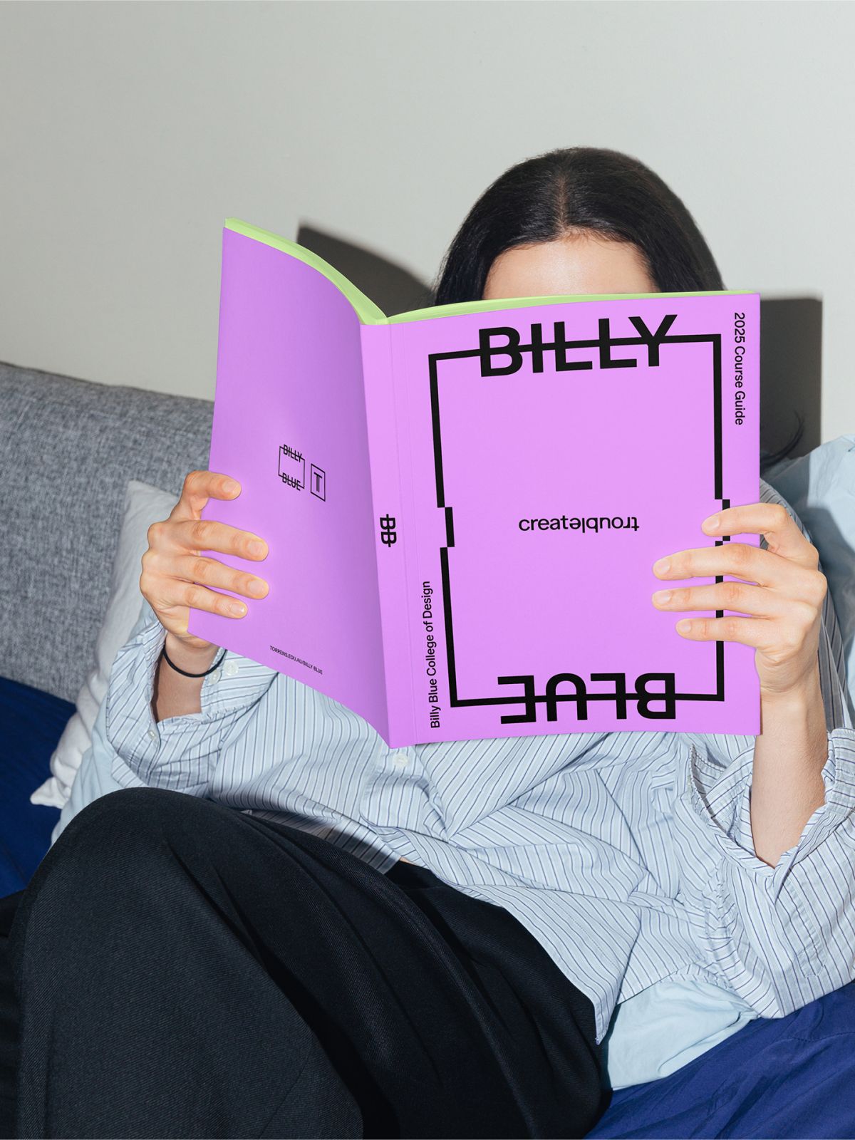 Girl reading Billy Blue magazine.