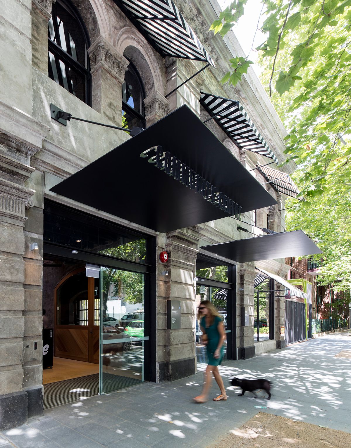 Community Centre typographic cut outs in awnings at the front of the building
