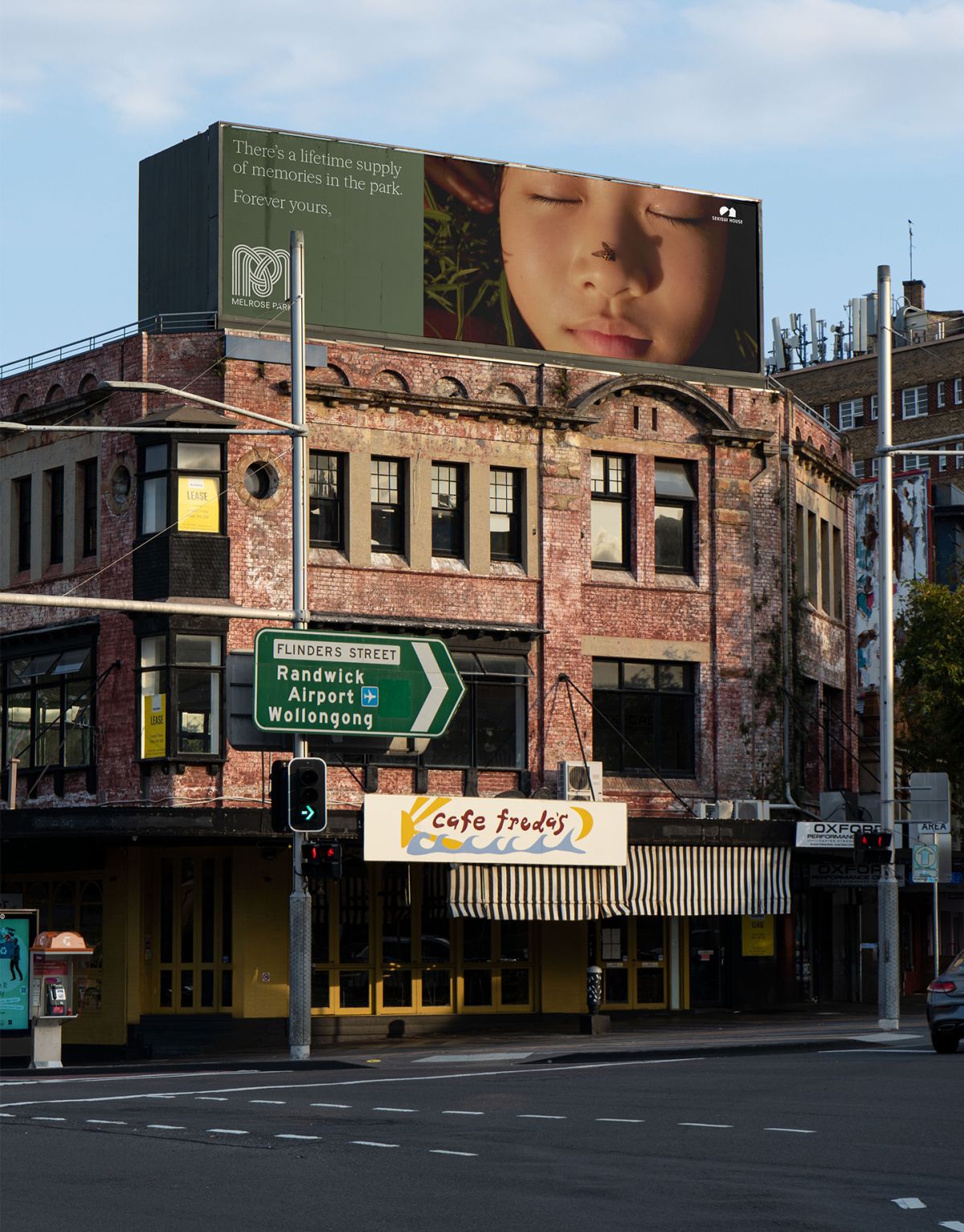 Melrose Park billboard outside Cafe Freda's on Oxford Street in Sydney