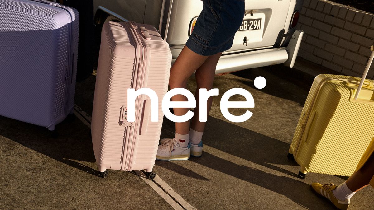 Nere logo over image with suitcases