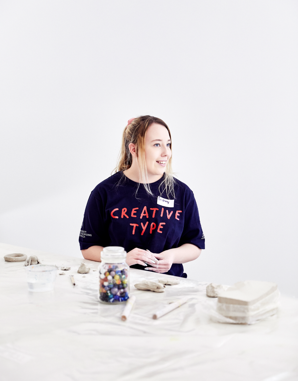 Person wearing University of Wollongong shirt