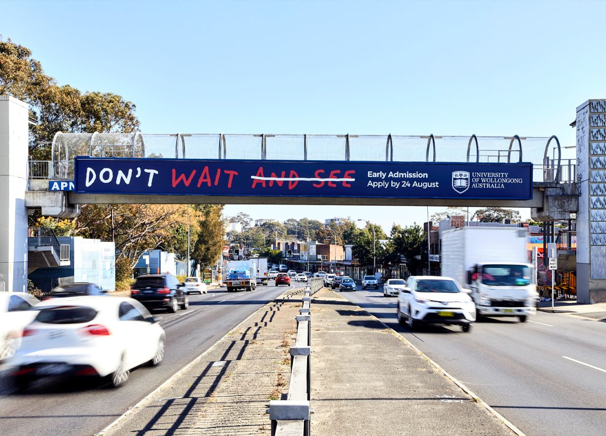 University of Wollongong signage on bridge